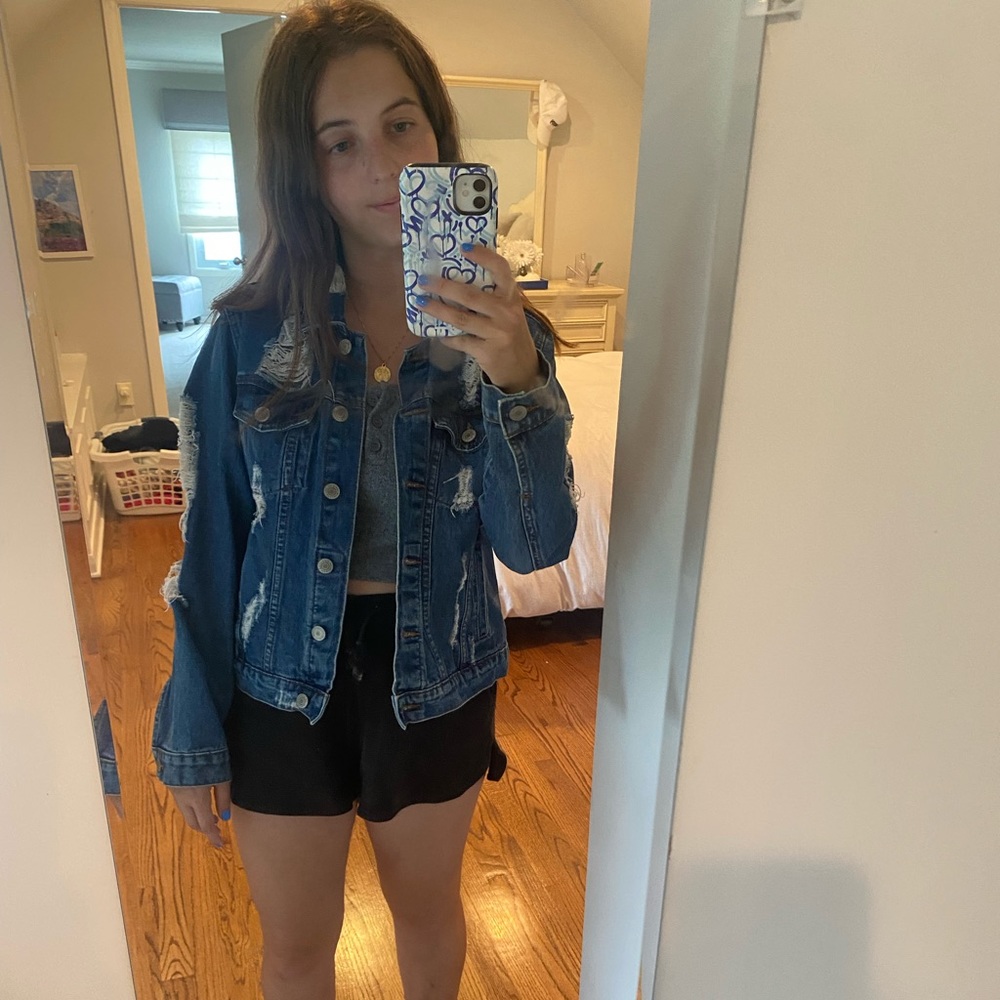 Super cute jean jacket with rips
